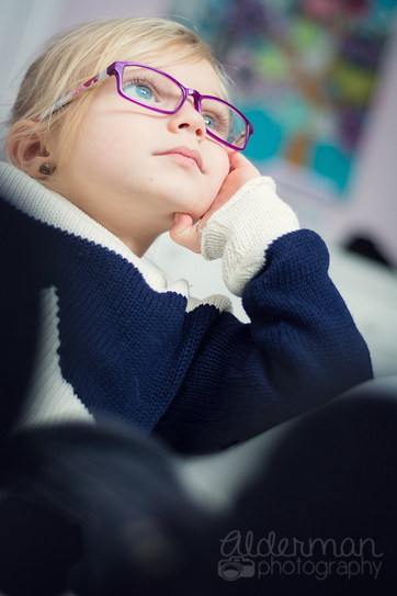 pensive girl with glasses